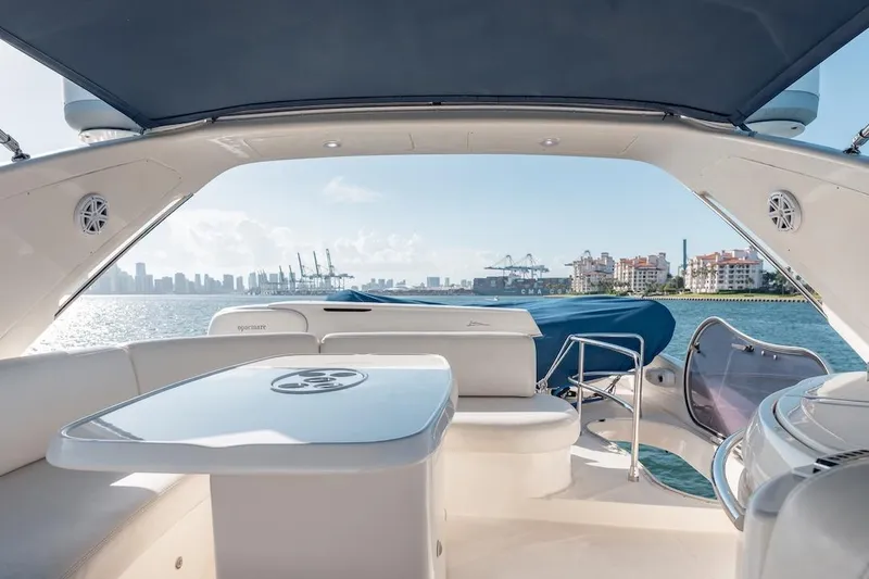 Slide: The Image of Luxurious 2007 Azimut 62 Evolution yacht interior with ocean view and city skyline. - 42