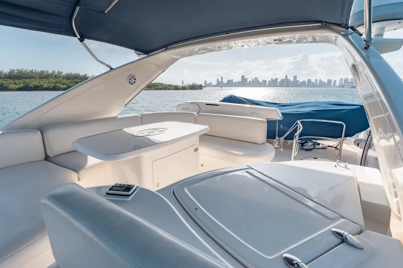 Slide: The Image of Luxurious 2007 Azimut 62 Evolution yacht interior with ocean and city skyline view. - 43