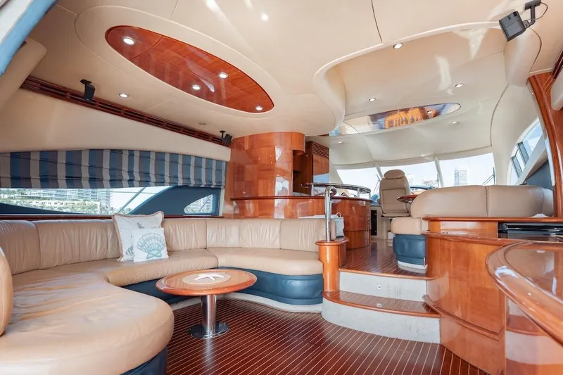 Slide: The Image of Luxurious interior of a 2007 Azimut 62 Evolution yacht with elegant wood finishes. - 47