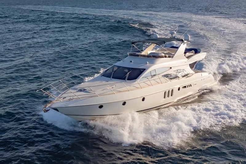 Slide: The Image of Luxury 2007 Azimut 62 Evolution yacht cruising on open sea. - 5