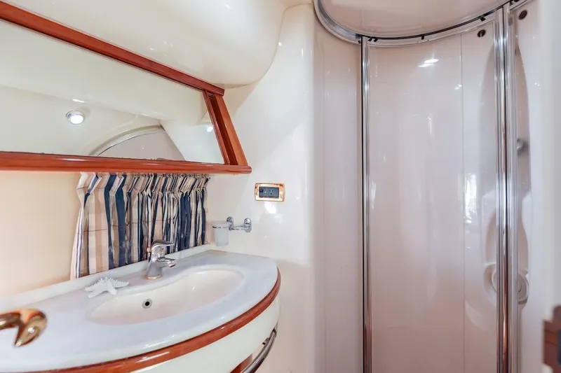 Slide: The Image of Luxurious bathroom in 2007 Azimut 62 Evolution yacht with modern fixtures and shower. - 65