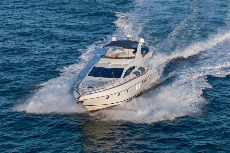 Slide: The Image of Luxury 2007 Azimut 62 Evolution yacht cruising on open sea. - 9