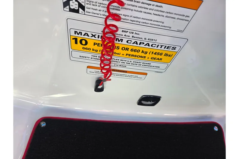 Slide: The Image of 2012 Sea-Doo 210 Wake boat capacity label, maximum 10 persons or 1456 lbs. - 16