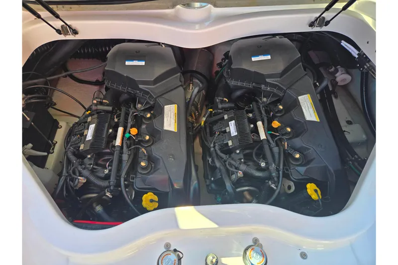 Slide: The Image of 2012 Sea-Doo Sport Boats 210 Wake engine compartment with dual engines. - 23