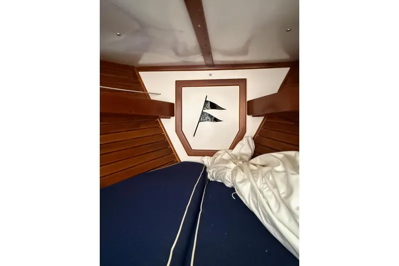 Slide: The Image of Interior of 1981 Kaiser 34' Gale Force cutter with wood paneling and decorative tiles. - 12