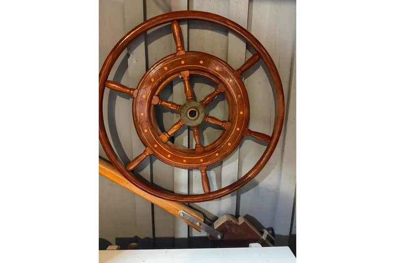 Slide: The Image of Interior of 1981 Kaiser 34' Gale Force cutter with wooden cabinetry and fire extinguisher. - 20