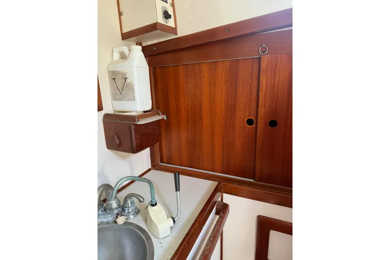 Slide: The Image of Mast and rigging of 1981 Kaiser 34' Gale Force offshore cutter against cloudy sky. - 28