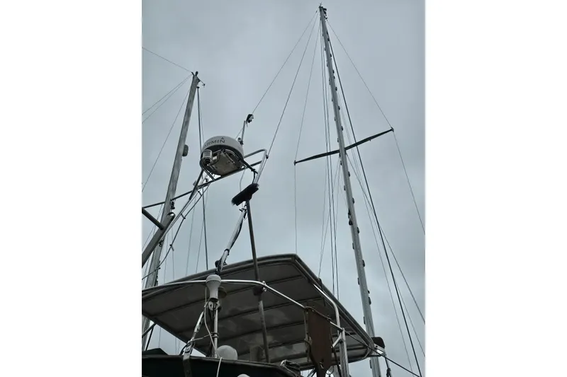 Slide: The Image of Close-up of a Kaiser 34' Gale Force 1981 tachometer, showing 3064 hours. - 34