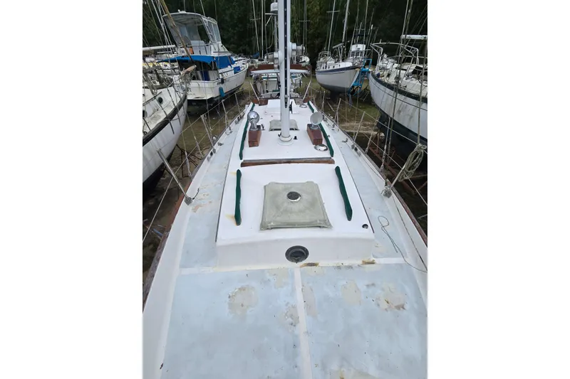 Slide: The Image of Interior of 1981 Kaiser 34' Gale Force offshore cutter with navigation equipment and storage. - 36