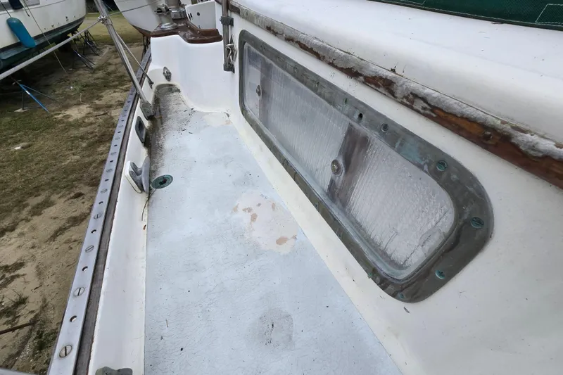 Slide: The Image of Interior of 1981 Kaiser 34' Gale Force offshore cutter, featuring a compact kitchen area. - 37