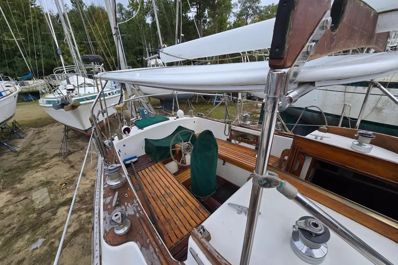 Slide: The Image of Radio equipment on 1981 Kaiser 34' Gale Force offshore cutter, featuring communication devices. - 39