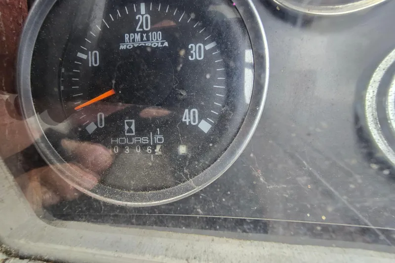 Slide: The Image of Interior of 1981 Kaiser 34' Gale Force cutter with wooden steps and compact kitchen area. - 41