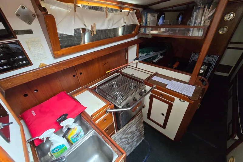 Slide: The Image of Stove in 1981 Kaiser 34' Gale Force offshore cutter yacht kitchen. - 45