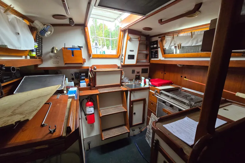 Slide: The Image of Cozy cabin interior of 1981 Kaiser 34' Gale Force offshore cutter sailboat. - 48