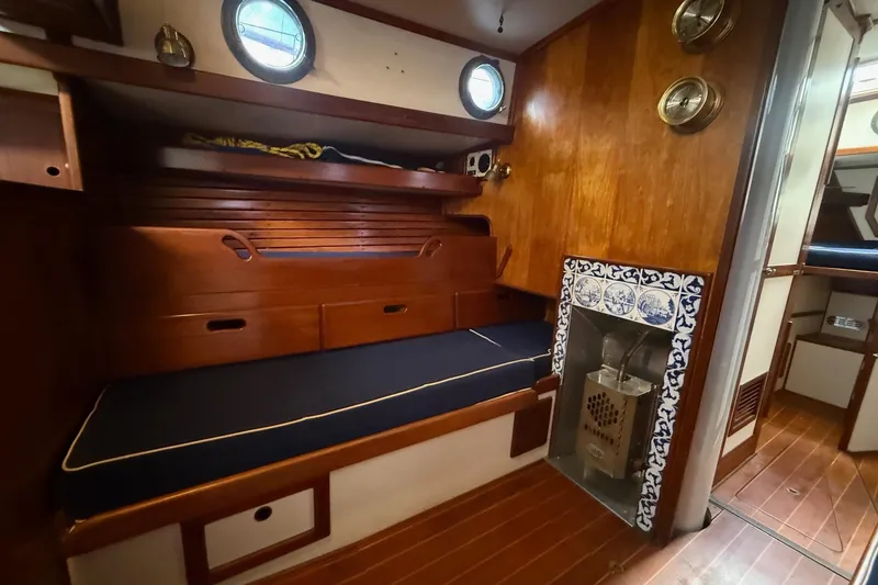 Slide: The Image of Brass instruments on wooden panel inside 1981 Kaiser 34' Gale Force offshore cutter. - 6