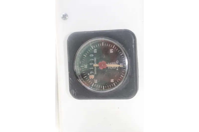 Slide: The Image of Engine hour meter on 2001 Beneteau 411 sailboat dashboard. - 14