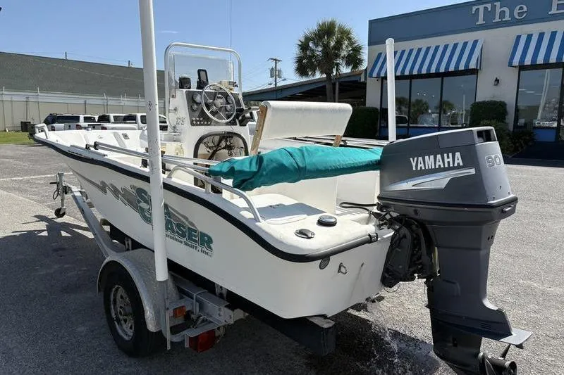 Slide: The Image of 2004 Carolina Skiff 175 boat with Yamaha 90 outboard motor on trailer. - 1