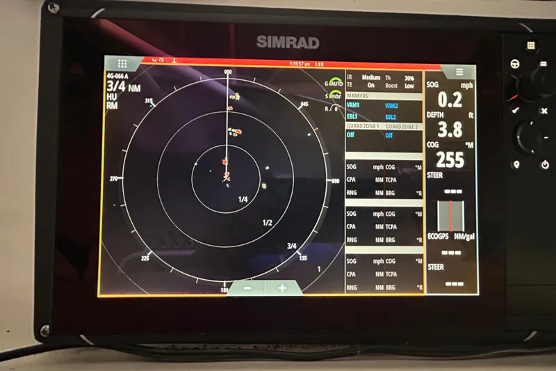 Slide: The Image of Simrad marine radar display on 2005 Fountain 48 Express Cruiser showing navigation data. - 23