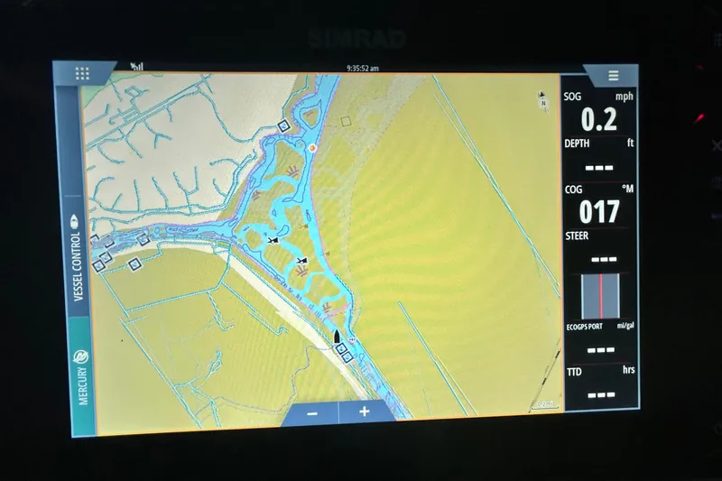 Slide: The Image of Navigation display on 2005 Fountain 48 Express Cruiser showing map and vessel data. - 24