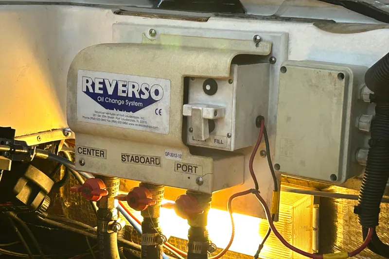 Slide: The Image of Reverso oil change system in 2005 Fountain 48 Express Cruiser engine room. - 30