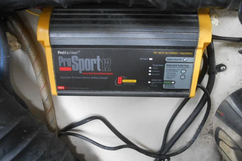 Slide: The Image of ProMariner ProSport 12 marine battery charger in a 2015 Cobalt 296 boat. - 26