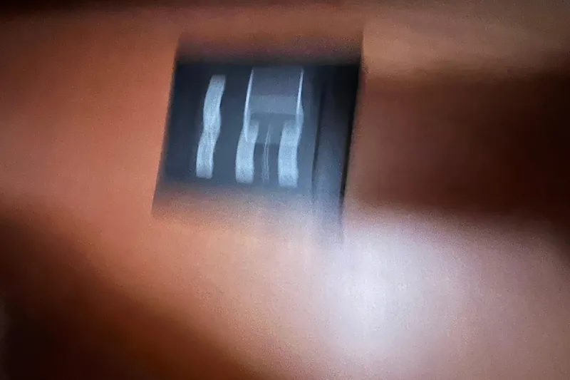 Slide: The Image of Blurry image of a control panel on a 2005 Sabre Flybridge yacht. - 32