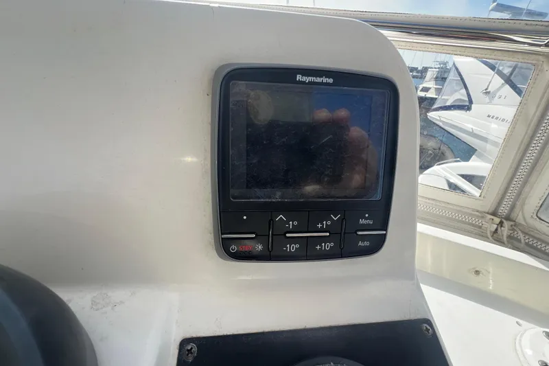 Slide: The Image of Raymarine navigation system on 2005 Sabre Flybridge yacht dashboard. - 55