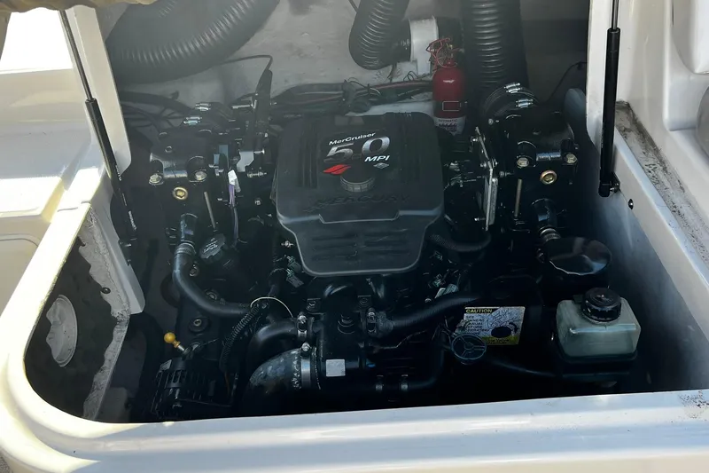 Slide: The Image of Engine compartment of a 2003 Sea Ray 220 Sundeck with MerCruiser MPI engine. - 9