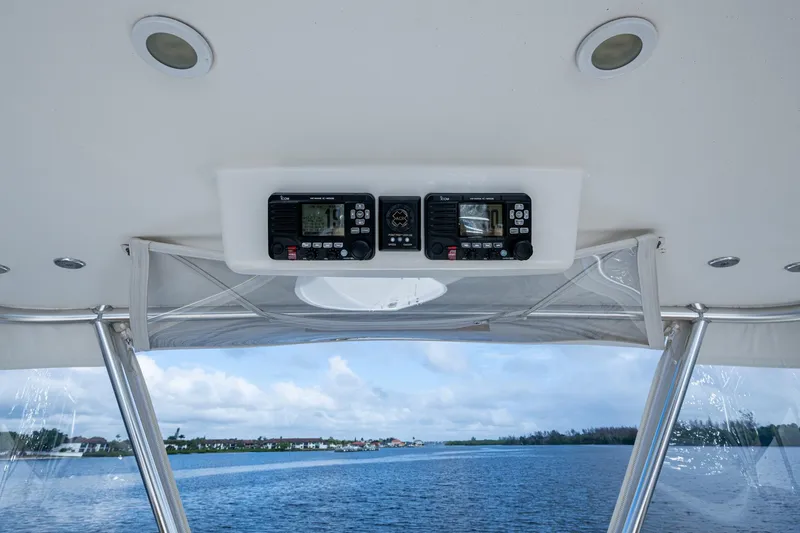 Slide: The Image of Interior view of 2008 Ocean Yachts 37 Billfish, featuring navigation equipment and scenic waterway. - 13