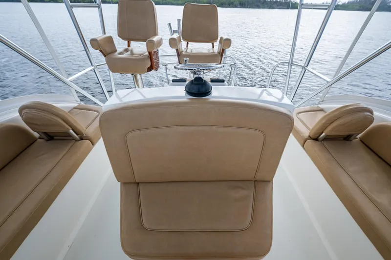 Slide: The Image of Luxury seating on 2008 Ocean Yachts 37 Billfish, overlooking serene waters. - 19