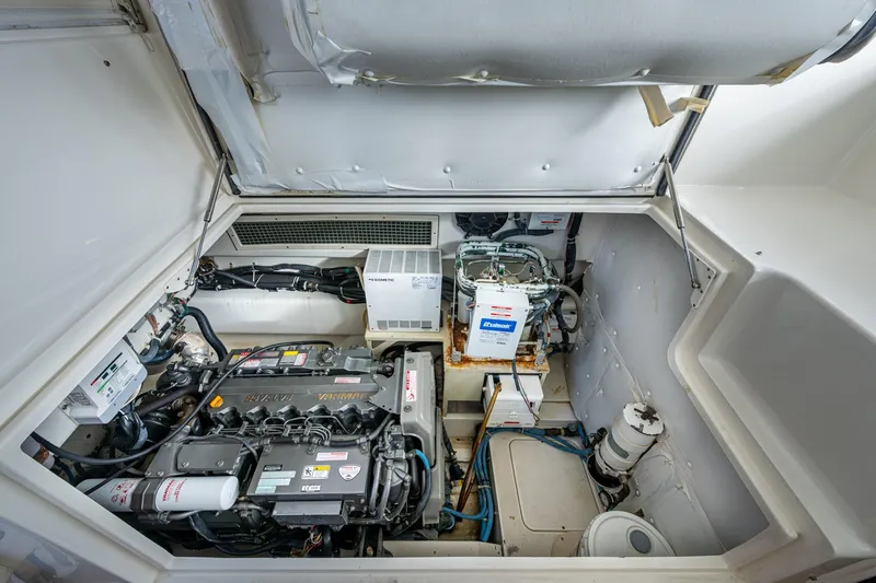 Slide: The Image of Engine room of 2008 Ocean Yachts 37 Billfish, showcasing mechanical components and systems. - 42