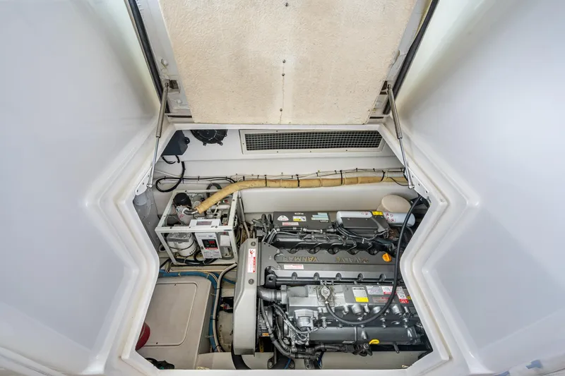 Slide: The Image of Engine room of 2008 Ocean Yachts 37 Billfish, showcasing mechanical components and systems. - 43