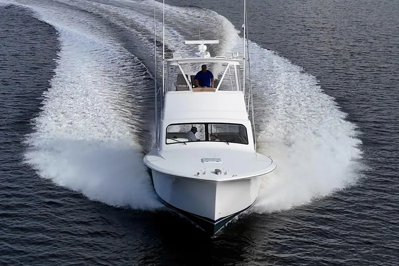 Slide: The Image of Ocean Yachts 37 Billfish 2008 cruising on open water, creating a dynamic wake. - 7