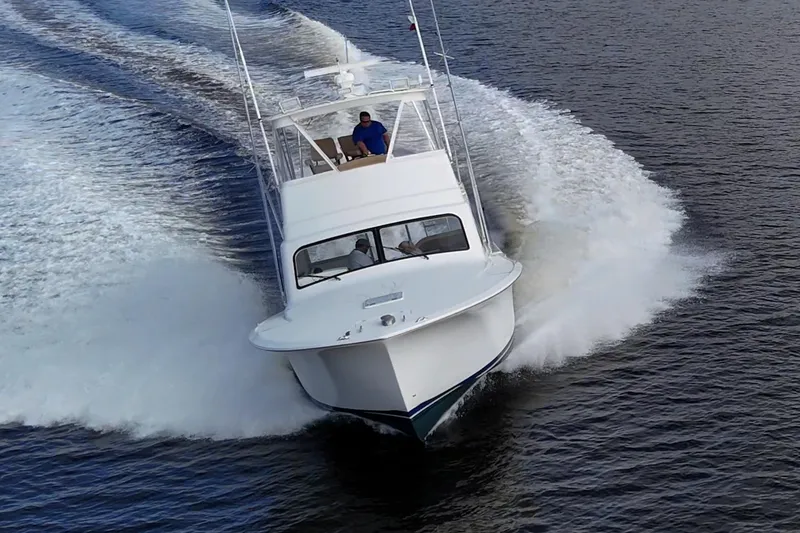 Slide: The Image of 2008 Ocean Yachts 37 Billfish cruising swiftly on open water. - 10