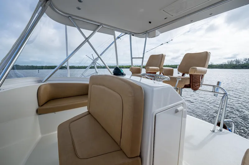Slide: The Image of 2008 Ocean Yachts 37 Billfish interior with tan seating and water view. - 15