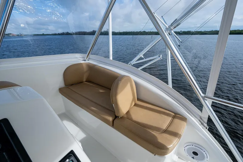 Slide: The Image of 2008 Ocean Yachts 37 Billfish interior with tan seating, overlooking serene water. - 18