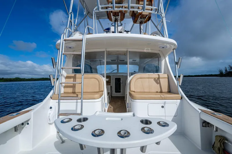Slide: The Image of 2008 Ocean Yachts 37 Billfish boat interior with seating and fishing rod holders. - 22