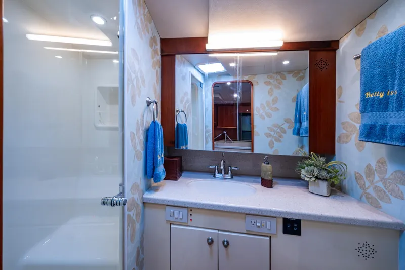 Slide: The Image of Luxurious bathroom interior of 2008 Ocean Yachts 37 Billfish with modern fixtures and decor. - 33