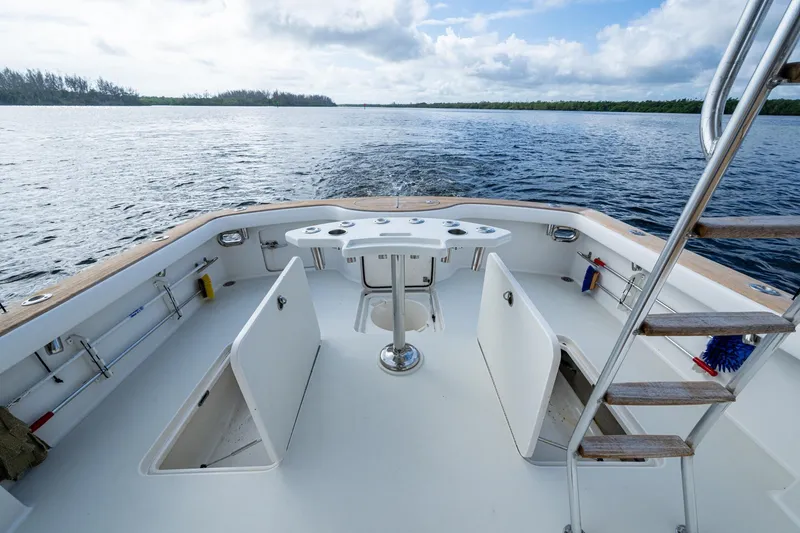 Slide: The Image of 2008 Ocean Yachts 37 Billfish boat deck with open hatches and fishing rod holders. - 40