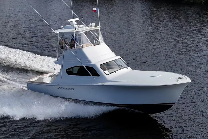 Slide: The Image of 2008 Ocean Yachts 37 Billfish cruising on open water, showcasing sleek design and performance. - 9