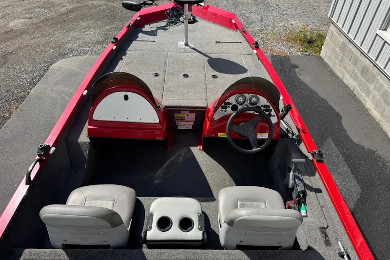 Slide: The Image of 2013 Alumacraft Pro 185 boat interior with dual seats and steering console. - 13