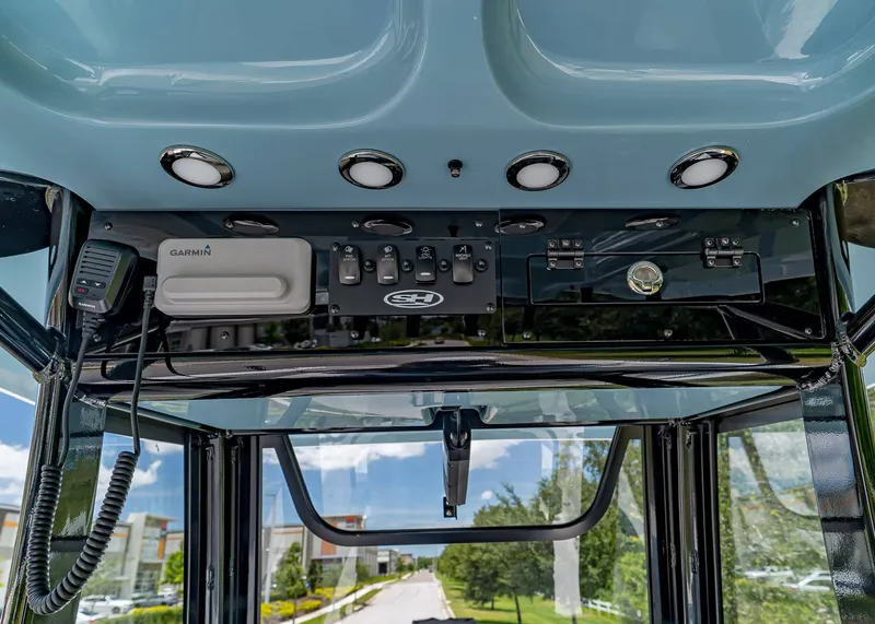 Slide: The Image of Control panel of 2026 Sea Hunt Ultra 245 SE boat with Garmin equipment. - 17