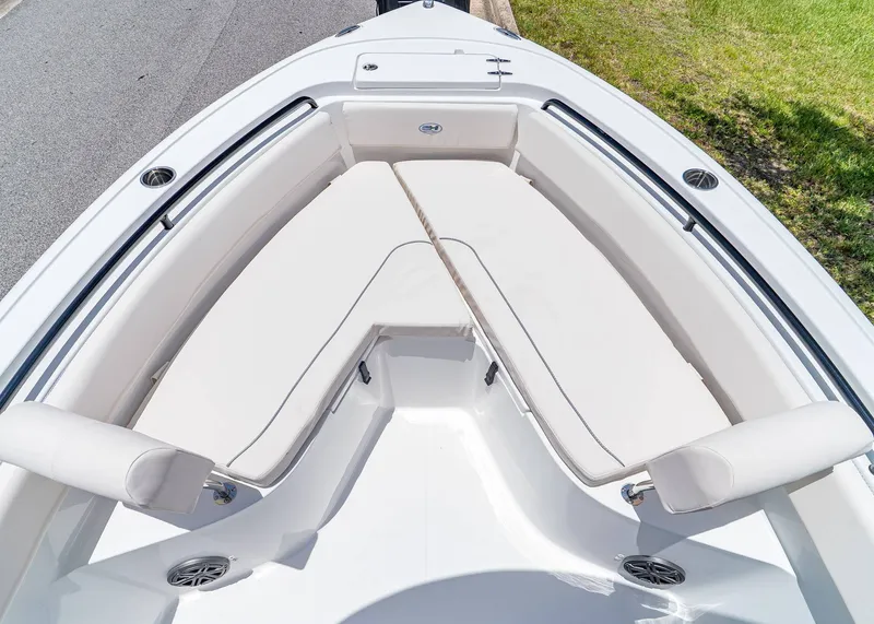 Slide: The Image of 2026 Sea Hunt Ultra 245 SE boat with spacious bow seating and sleek design. - 22