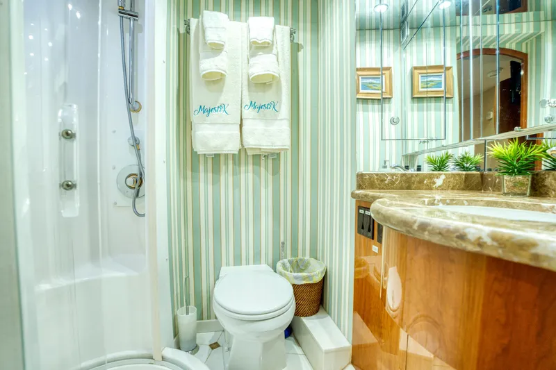Slide: The Image of Luxurious bathroom on 2007 Hatteras 80 Enclosed Bridge yacht with elegant decor. - 42