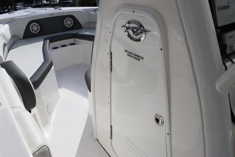 Slide: The Image of 2020 Tidewater 252 LXF boat interior with deluxe console head door. - 32