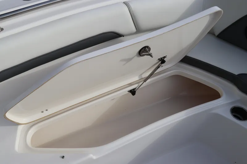 Slide: The Image of Open storage compartment on 2020 Tidewater 252 LXF boat, showcasing interior space. - 48