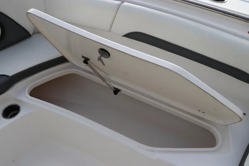Slide: The Image of Open storage compartment on a 2020 Tidewater 252 LXF boat interior. - 49