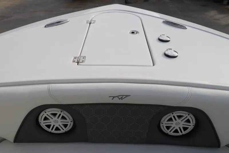 Slide: The Image of 2020 Tidewater 252 LXF boat bow with speakers and storage hatch. - 50