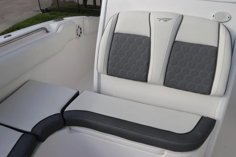 Slide: The Image of 2020 Tidewater 252 LXF boat interior with stylish gray and white seating. - 55