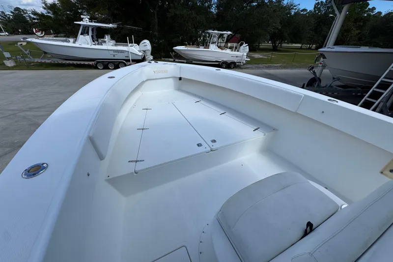 Slide: The Image of 2007 Venture 34 Open boat interior with spacious seating and storage compartments. - 20